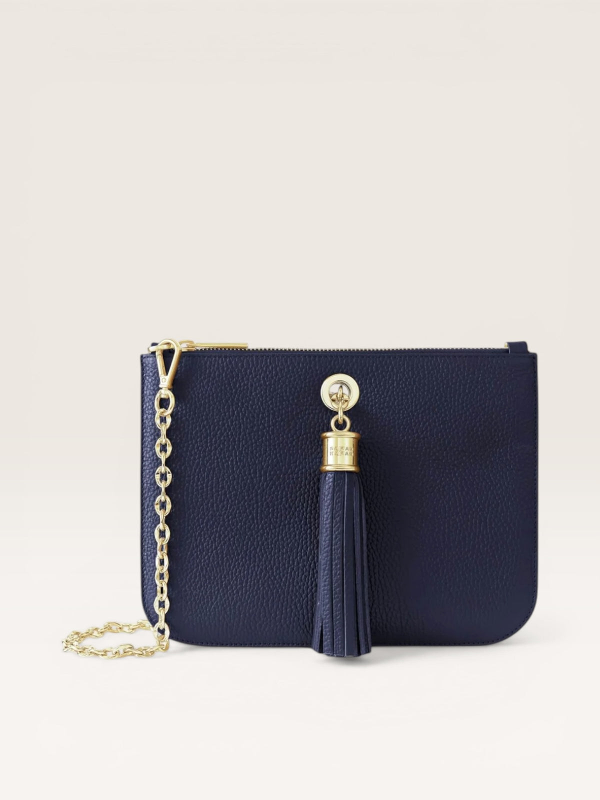 Sarah Haran ivy clutch with gold hardware